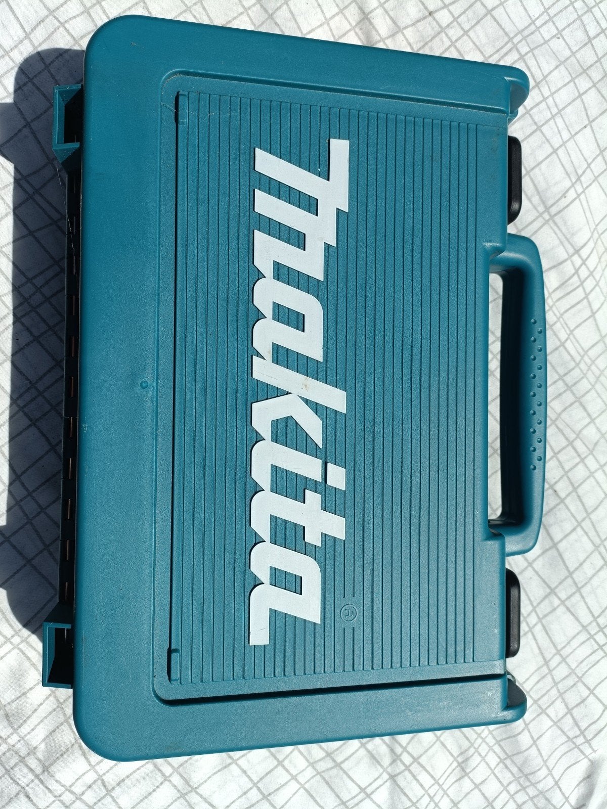 Makita kist DF012DSE, Ophalen