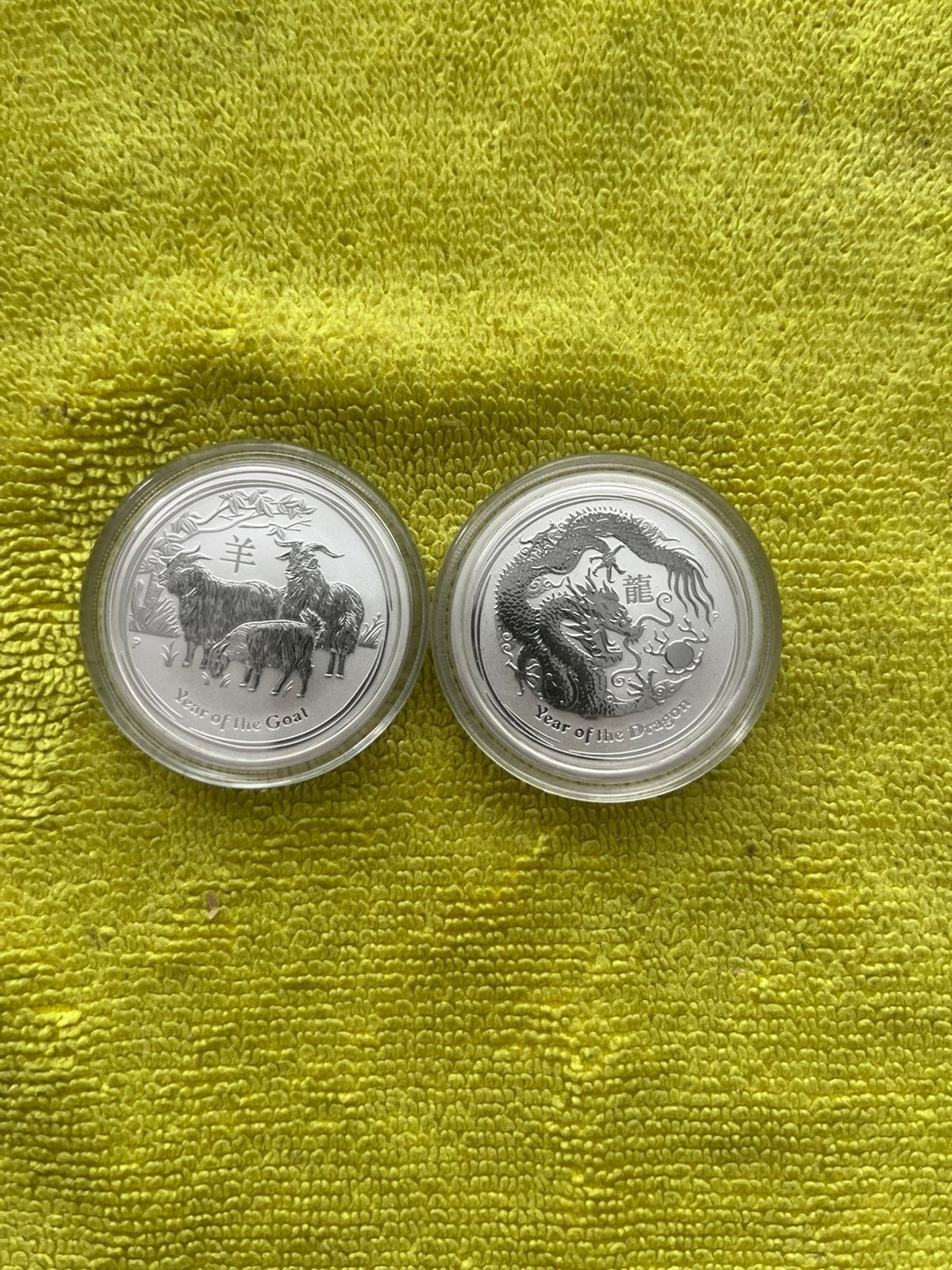 Australia 🇨🇰Lunar 2 dragon🐉rooster 🐔2x 1/2 ounce., Ophalen of Verzenden, Zilver
