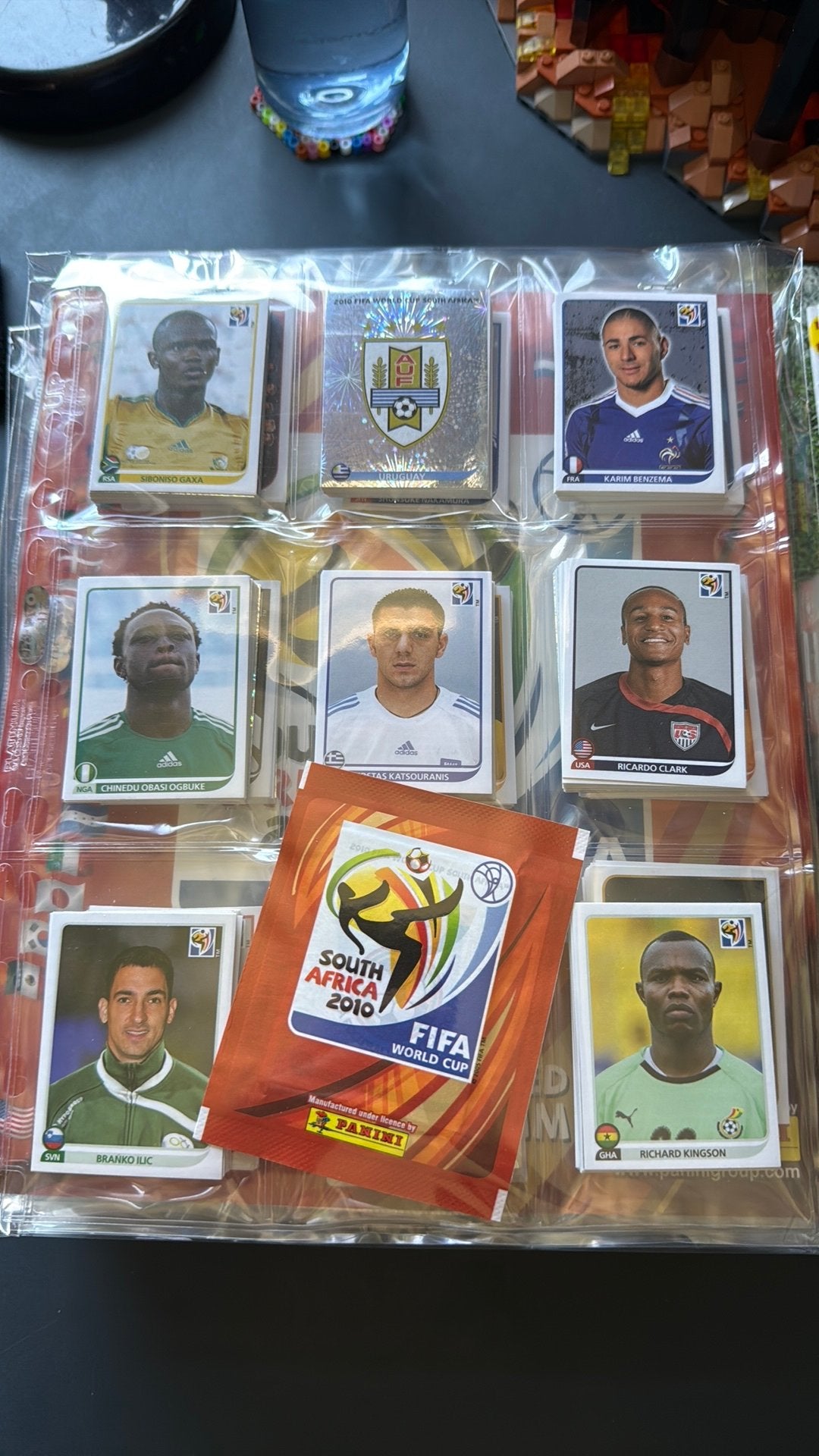 Panini WK 2010 complete set, leeg album en vol zakje, Ophalen of Verzenden, Zo goed als nieuw, Meerdere stickers