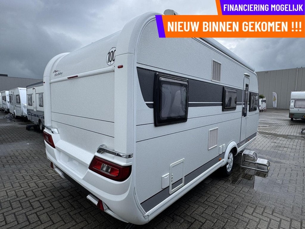 Hobby 545 KMF DE LUXE ED.,STAPELBED,DWARSBED,VOORTENT,AIRCO, Caravans en Kamperen, Caravans, Hordeur, Hobby, 7 tot 8 meter, Bedrijf