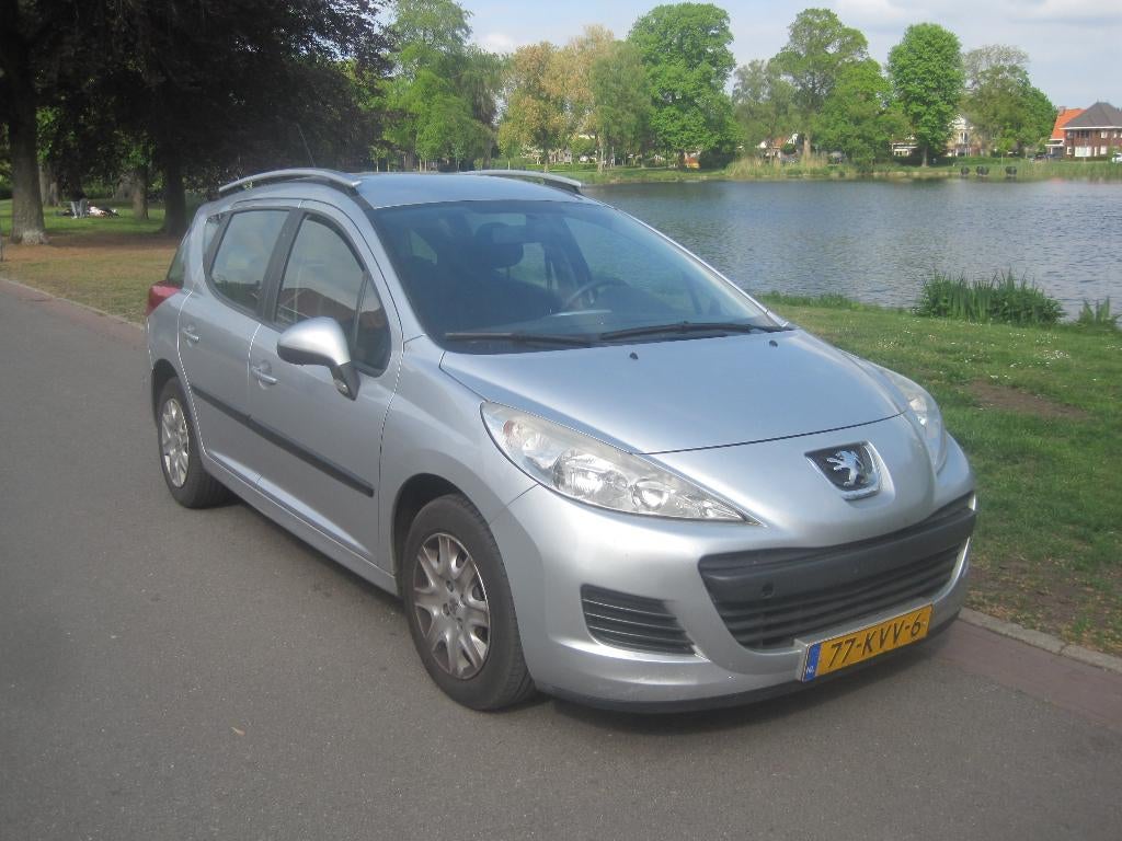 Peugeot 207 1.4 95pk 2010 Grijs, Voorwielaandrijving, Stof, Origineel Nederlands, Stationwagon
