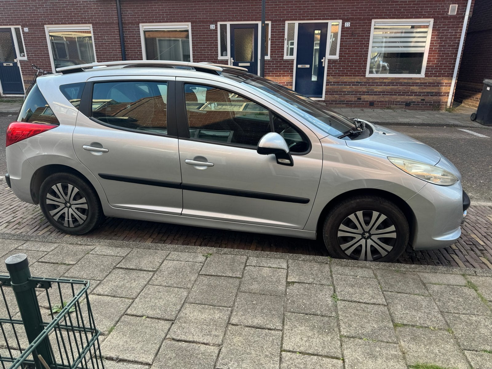Peugeot 207 1.6 16V SW Outdoor 2009 Grijs, Auto's, Voorwielaandrijving, Stof, Zwart, 4 cilinders