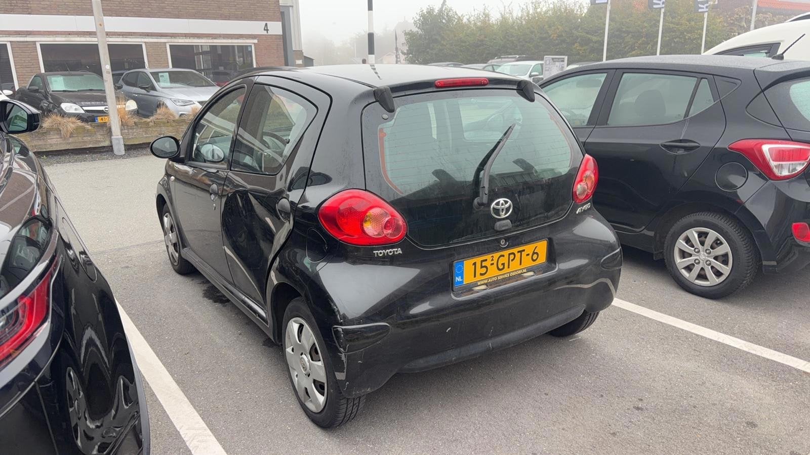 Toyota Aygo 1.0-12V Airco *APK 08-2027* KOPPELING DEFECT, Auto's, Voorwielaandrijving, Stof, Gebruikt, Zwart