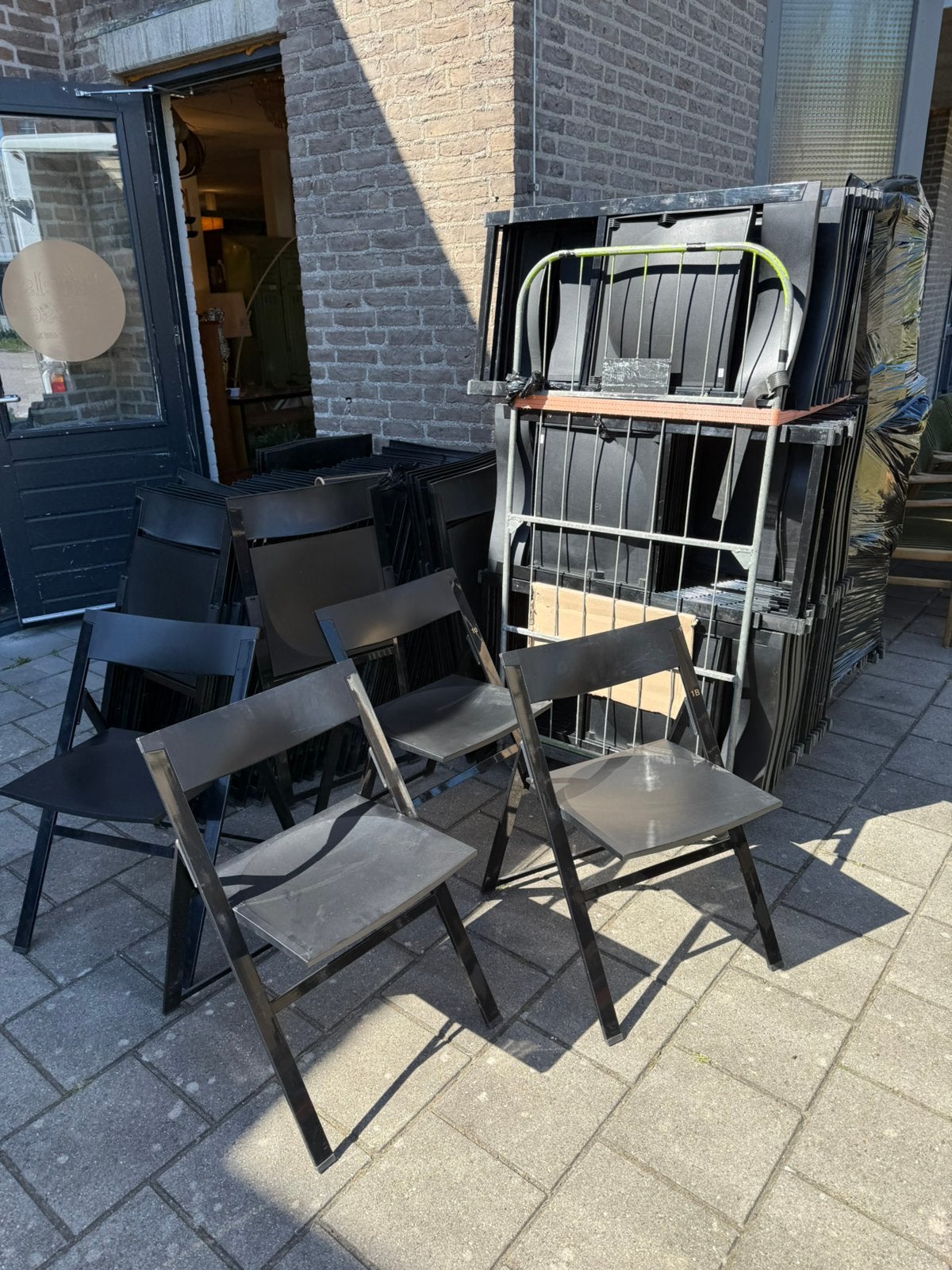 Partij van 180x ‘P08’ design klapstoel, Tecno ‘90, Vintage retro buisframe design rotan webbing papercord deens, Zwart, Ophalen of Verzenden