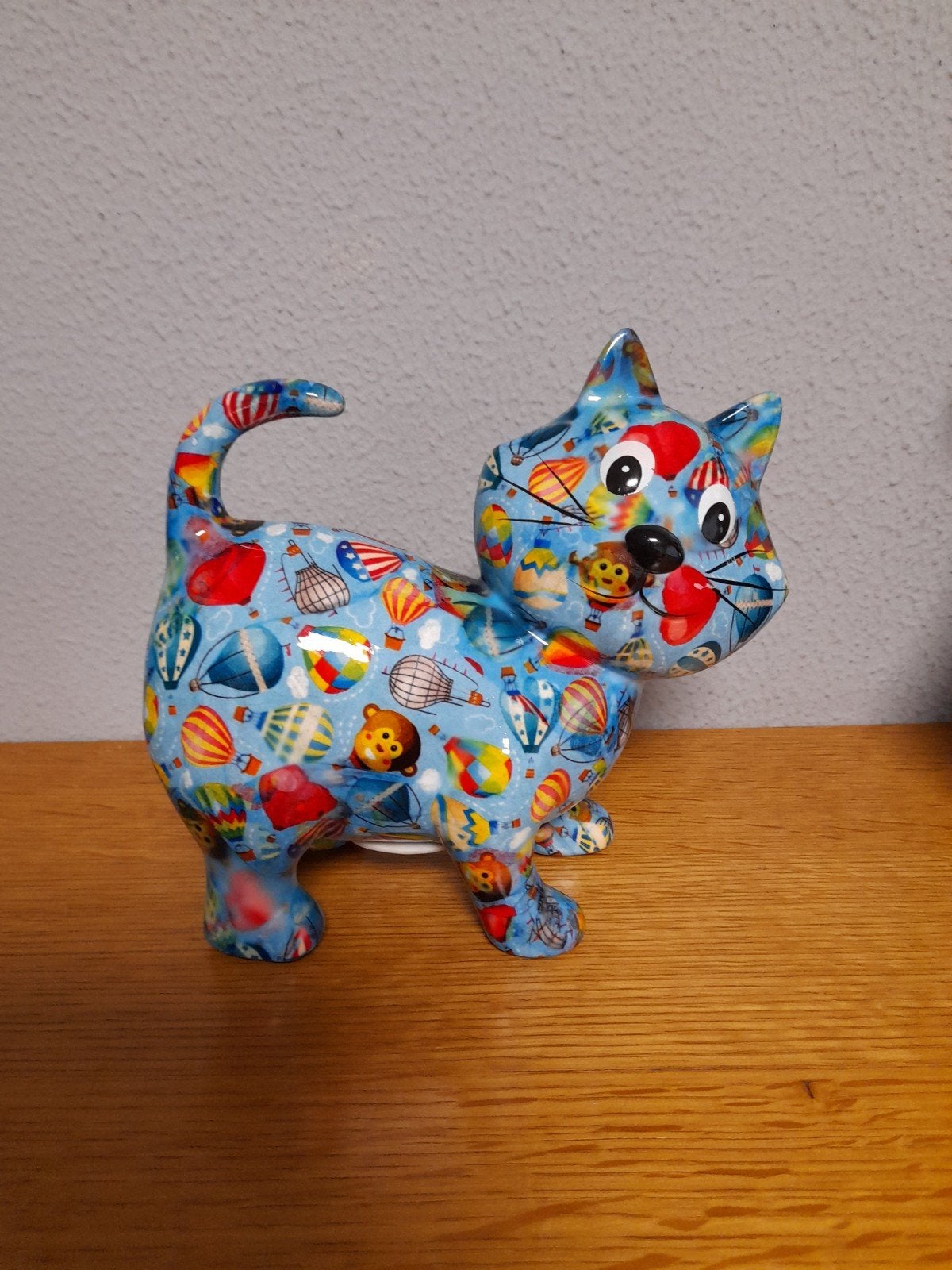 Pomme pidou Spaarpot van een kat genaamd dorothy, Verzamelen, Spaarpotten, Ophalen of Verzenden, Zo goed als nieuw, Steen, Aardewerk of Keramiek