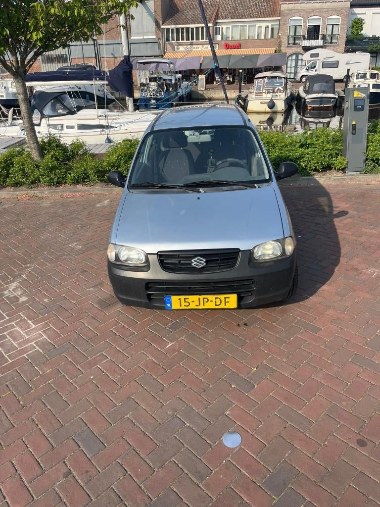 Suzuki Alto 1.1 2002 Grijs, Auto's, Suzuki, Voorwielaandrijving, 750 kg, 4 cilinders, 4 stoelen