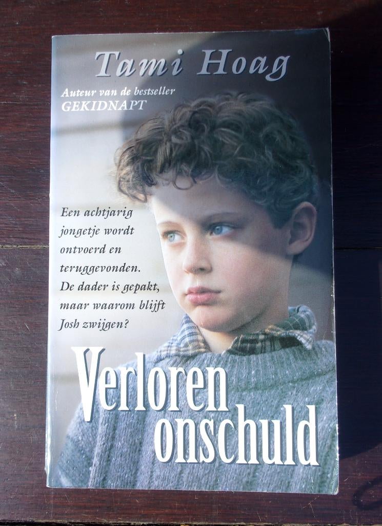 Tami Hoag - Verloren onschuld, Boeken, Ophalen of Verzenden, Gelezen