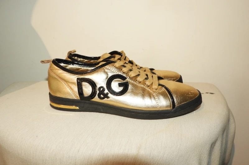 Dolce & Gabbana gouden leren sneakers zwarte details 37
