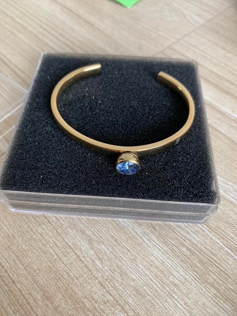 Gouden armband van Melano met blauwe steen, Ophalen of Verzenden, Zo goed als nieuw, Goud, Met edelsteen