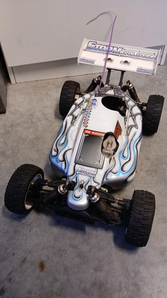 RC Nitro Storm Evolution met zender (zonder motor), Gebruikt, Auto offroad, Ophalen of Verzenden, Nitro