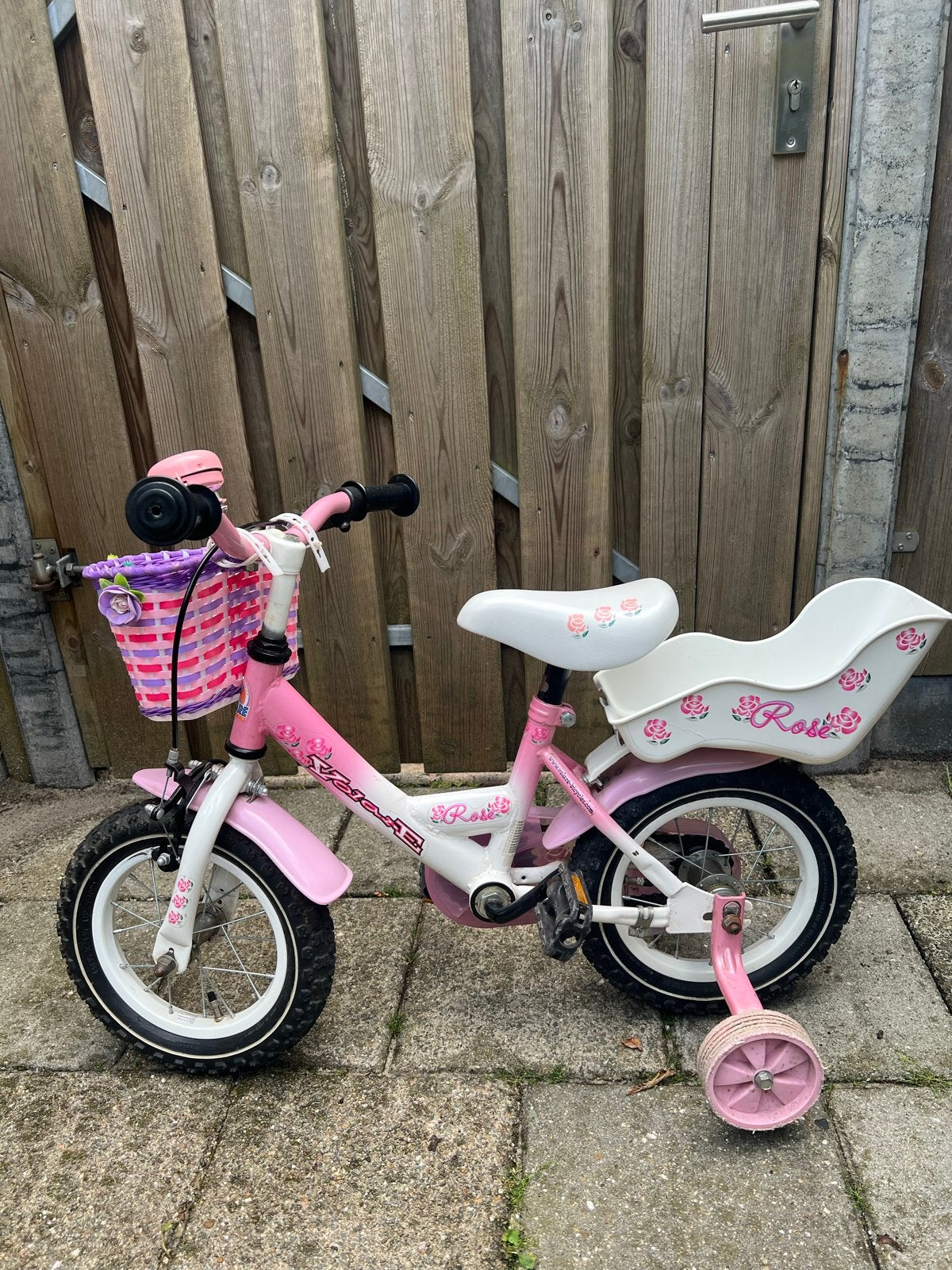 Roze kinderfiets met zijwieltjes en mandje 12 inch, Ophalen, Terugtraprem, Zijwieltjes, Gebruikt