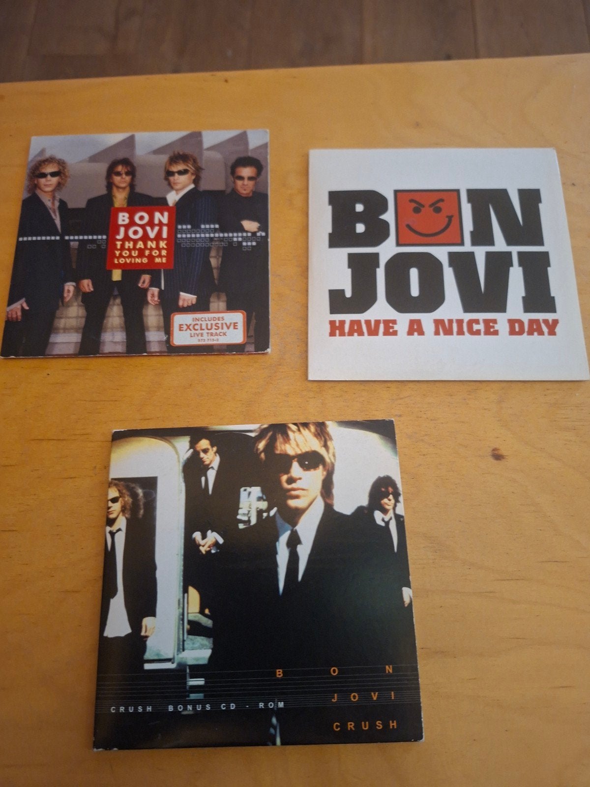 Bon Jovi CD Singles - Thank You For Loving Me & Crush, Ophalen of Verzenden, Gebruikt, Rock en Metal, Inclusief boekje