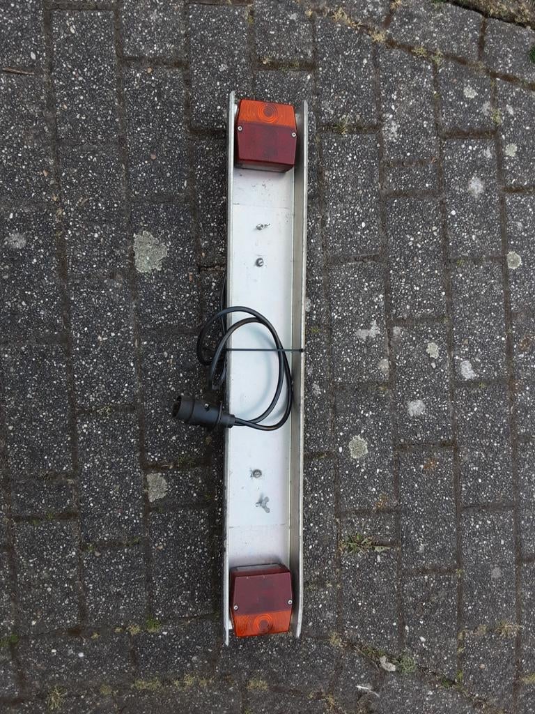 Lichtbalk fietsendrager, Ophalen
