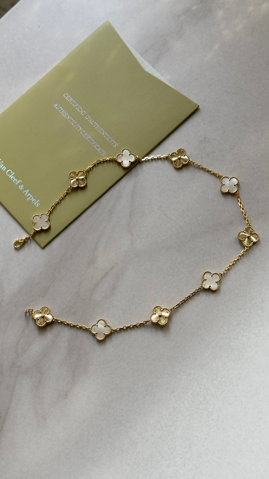 VAN CLEEF & ARPELS 10 MOTIEVEN KETTING, Ophalen of Verzenden, Nieuw, Goud, Goud