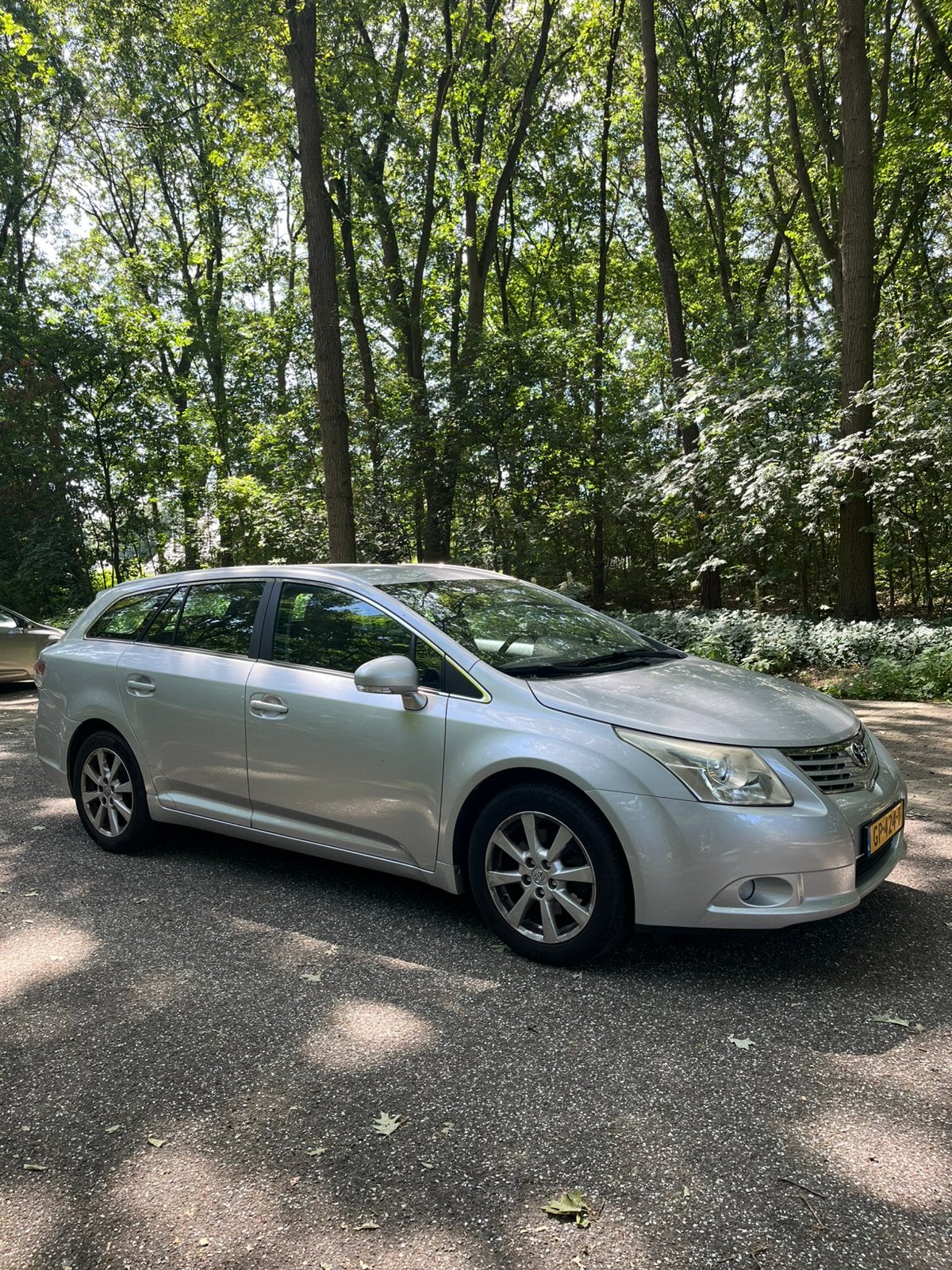 Toyota Avensis 2.2 D-4d Wagon 2010 Euro5, Auto's, Voorwielaandrijving, Euro 5, Stof, Zwart