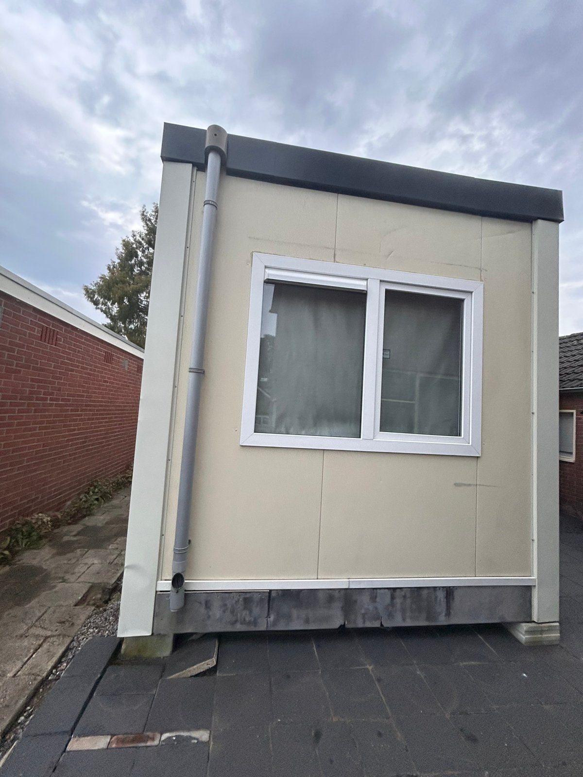 Unit/ Mantelzorgwoning/ Bedrijfsruimte, Ophalen