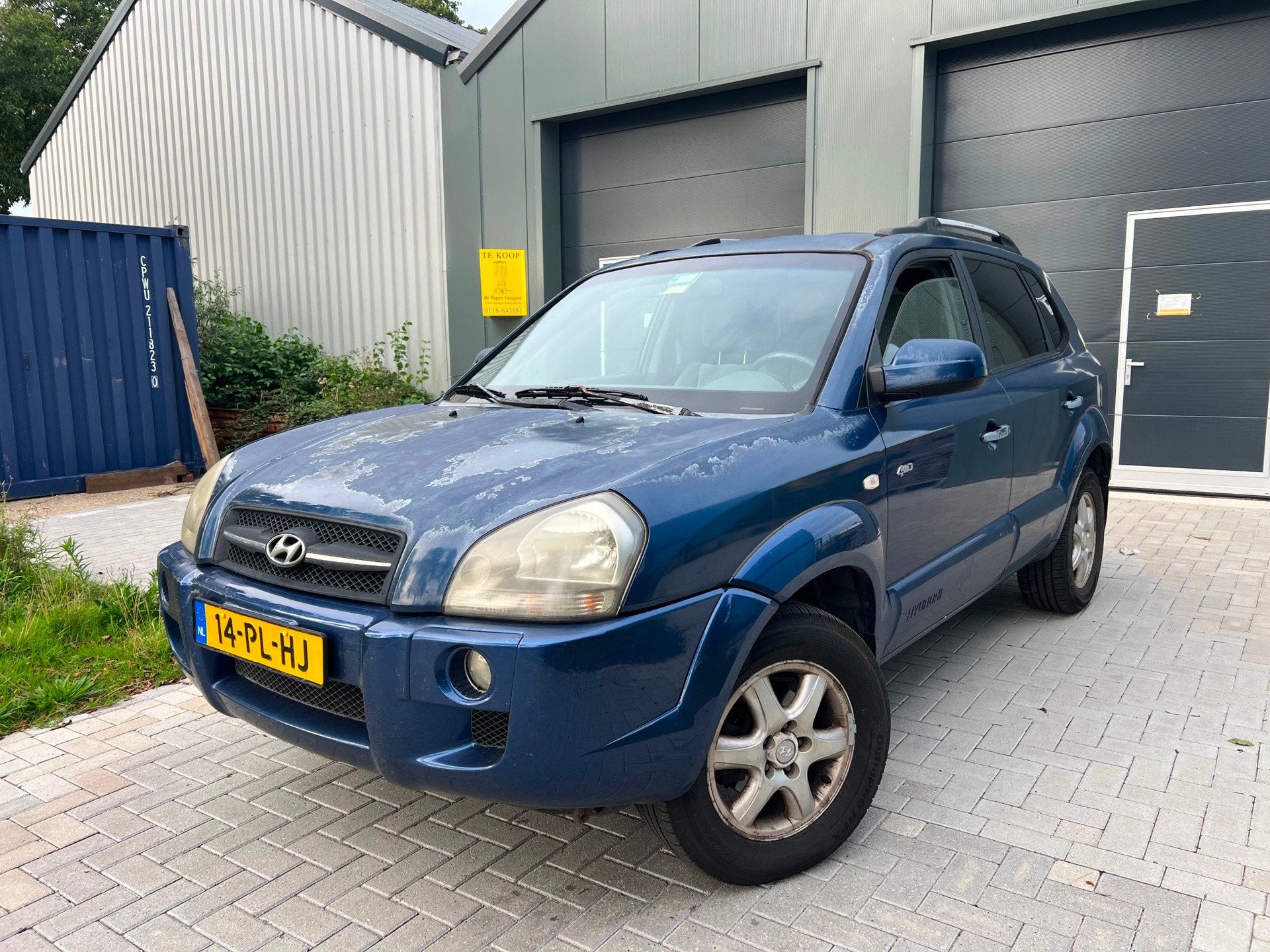 Hyundai Tucson 2.0i 4WD Style 4x4, Auto's, Gebruikt, 4 cilinders, Blauw, Metallic lak