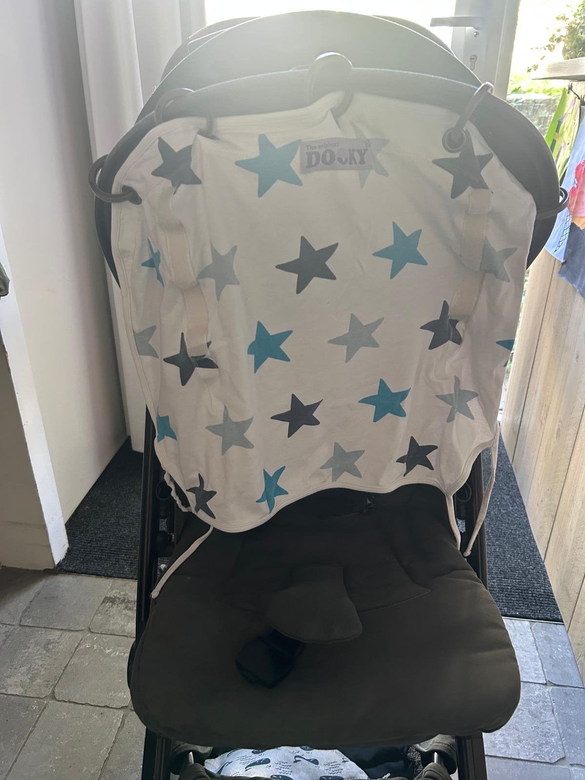Dooky zonnescherm met sterren voor kinderwagen/maxi-cosi, Ophalen of Verzenden, Zo goed als nieuw, Kinderwagen, Overige merken