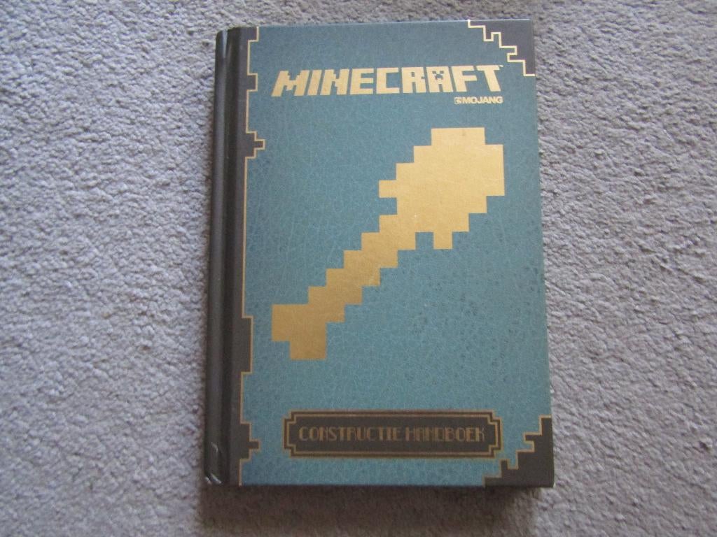 Boek: Minecraft - Constructie handboek, Gelezen, Fictie algemeen, Ophalen of Verzenden, Uitgeverij JP Books