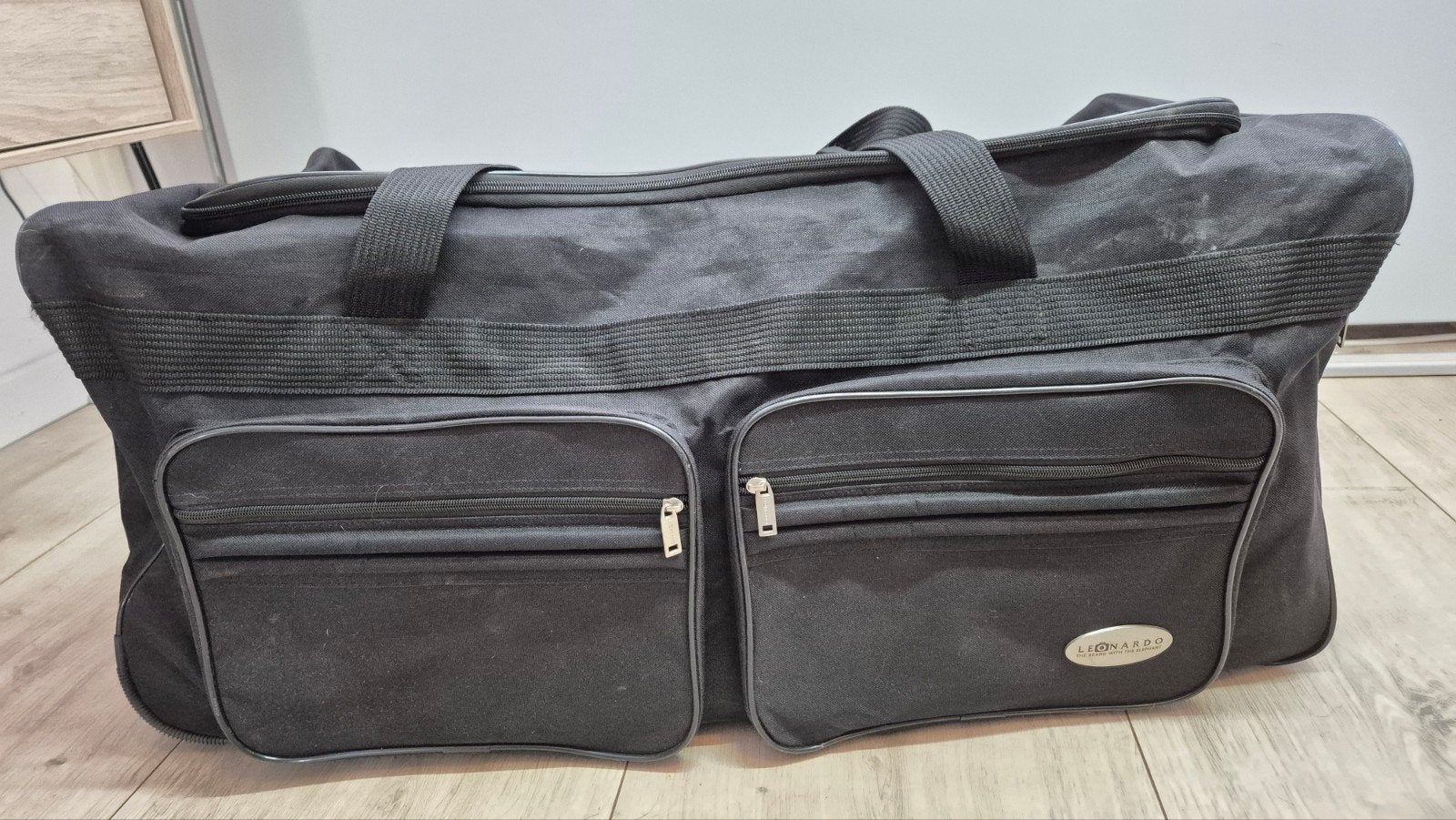 Zwarte reistas op wielen 70 liter - 65x35x30 cm - Zwart, Sieraden, Tassen en Uiterlijk, Tassen | Reistassen en Weekendtassen, Ophalen
