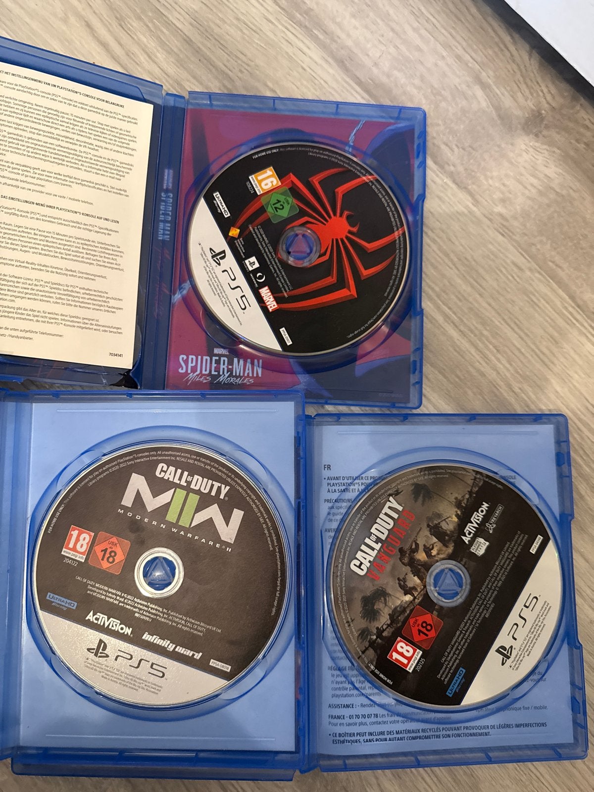 PS5 Games: Spider-Man Miles Morales, COD MW2 & Vanguard, Online, Vanaf 18 jaar, 1 speler, Zo goed als nieuw