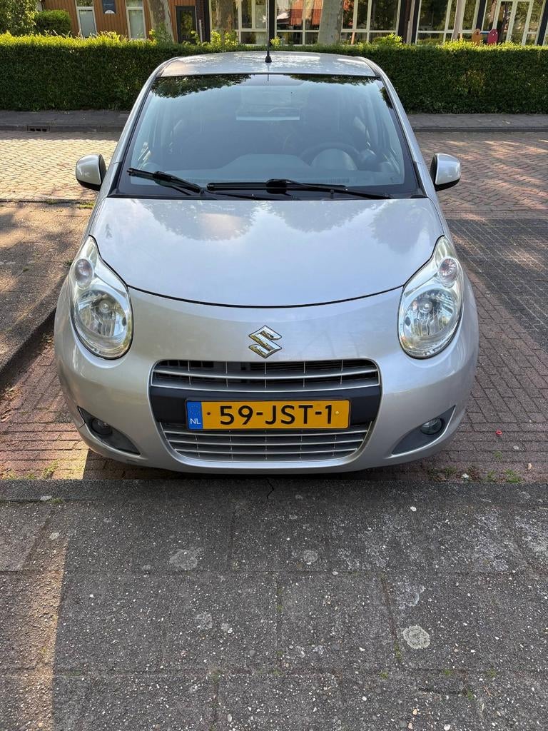 Suzuki Alto 1.0 2009 Grijs, Auto's, Voorwielaandrijving, 200 kg, 4 stoelen, Origineel Nederlands