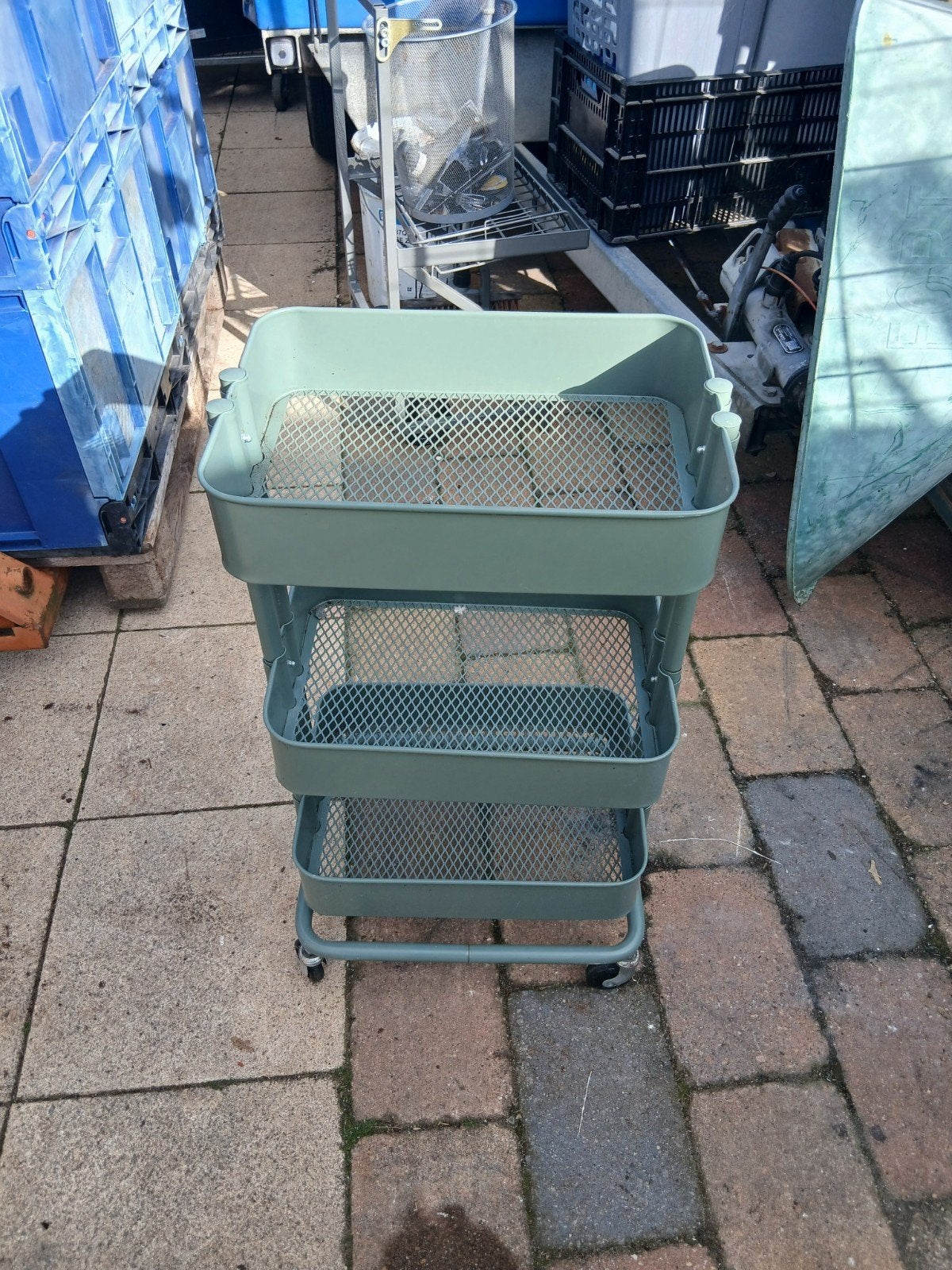 Gebruikte trolley met lichte roest, Ophalen