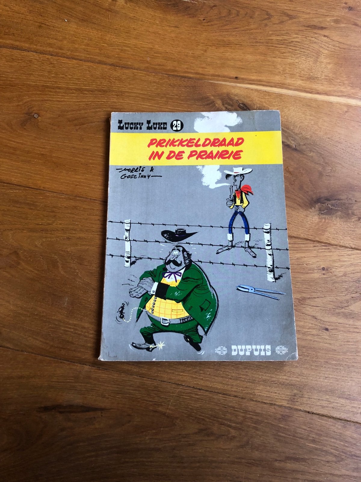 Lucky Luke 23 - Prikkeldraad in de Prairie (1968), Eén stripboek, Ophalen, Gelezen