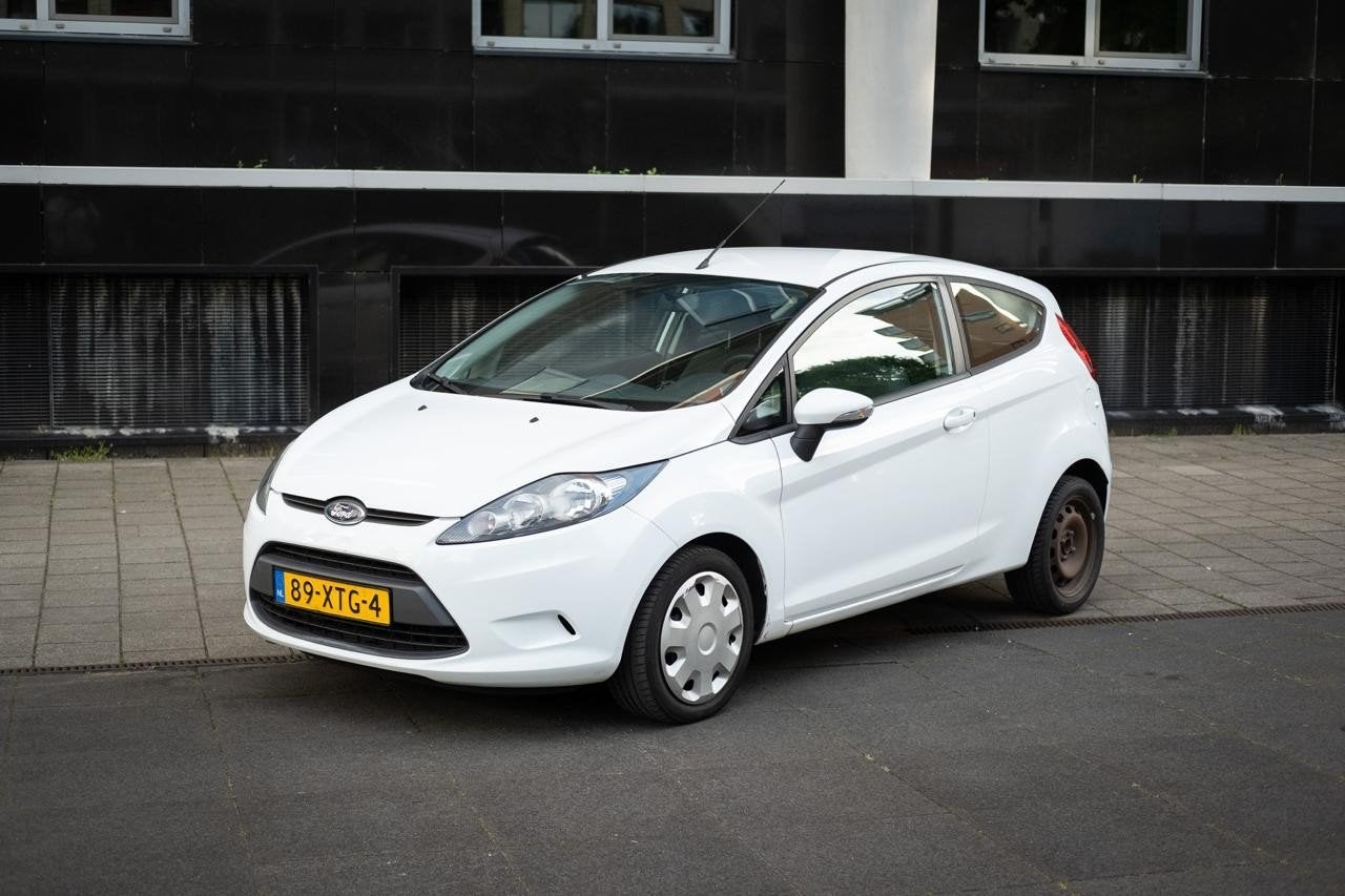 Ford Fiësta 1.25 44KW 3DR 2012 Wit, Auto's, Voorwielaandrijving, Stof, 4 cilinders, Wit