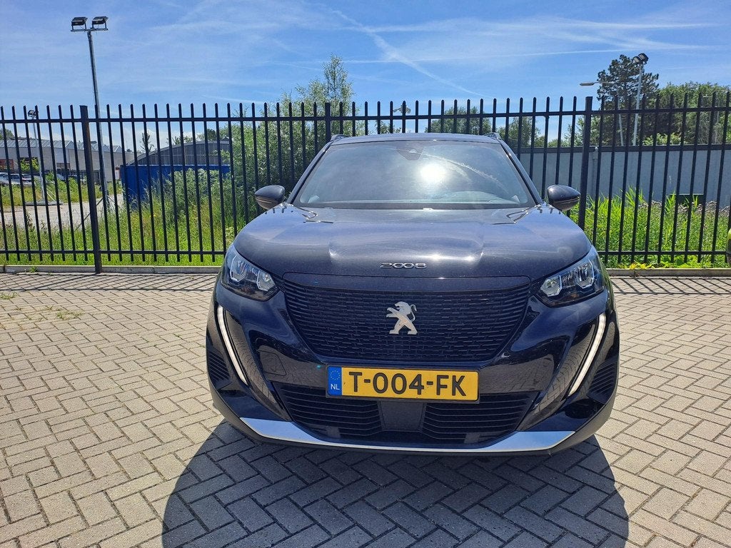 Peugeot e-2008 EV Allure Pack 50 kWh | Camera | Apple Carpla, Auto's, Peugeot, 136 pk, Gebruikt, Leder en Stof, Zwart