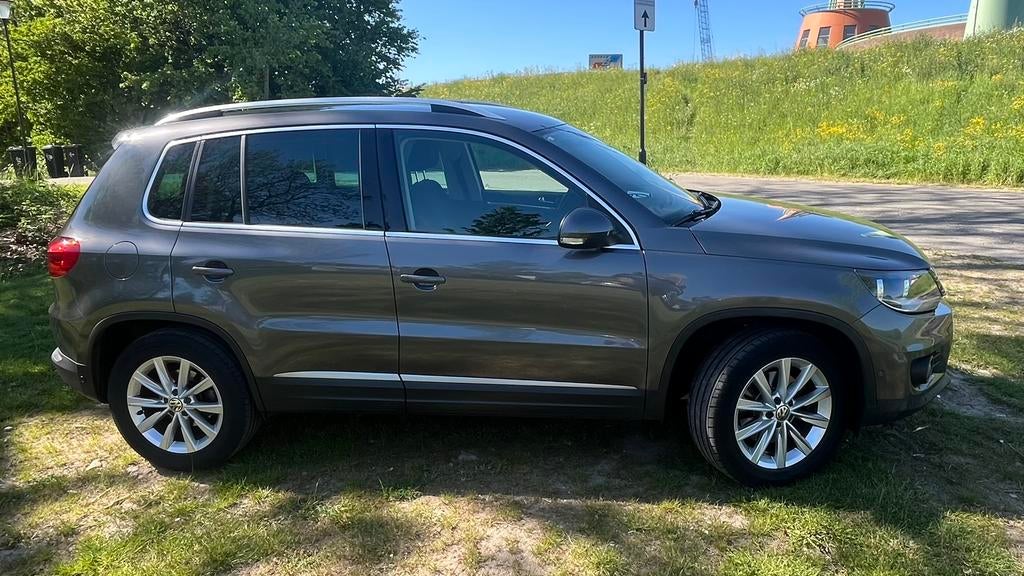 Volkswagen Tiguan 1.4 TSI 118KW BMT 2013 Grijs, Auto's, Volkswagen, Voorwielaandrijving, 15 km/l, 1800 kg, 4 cilinders