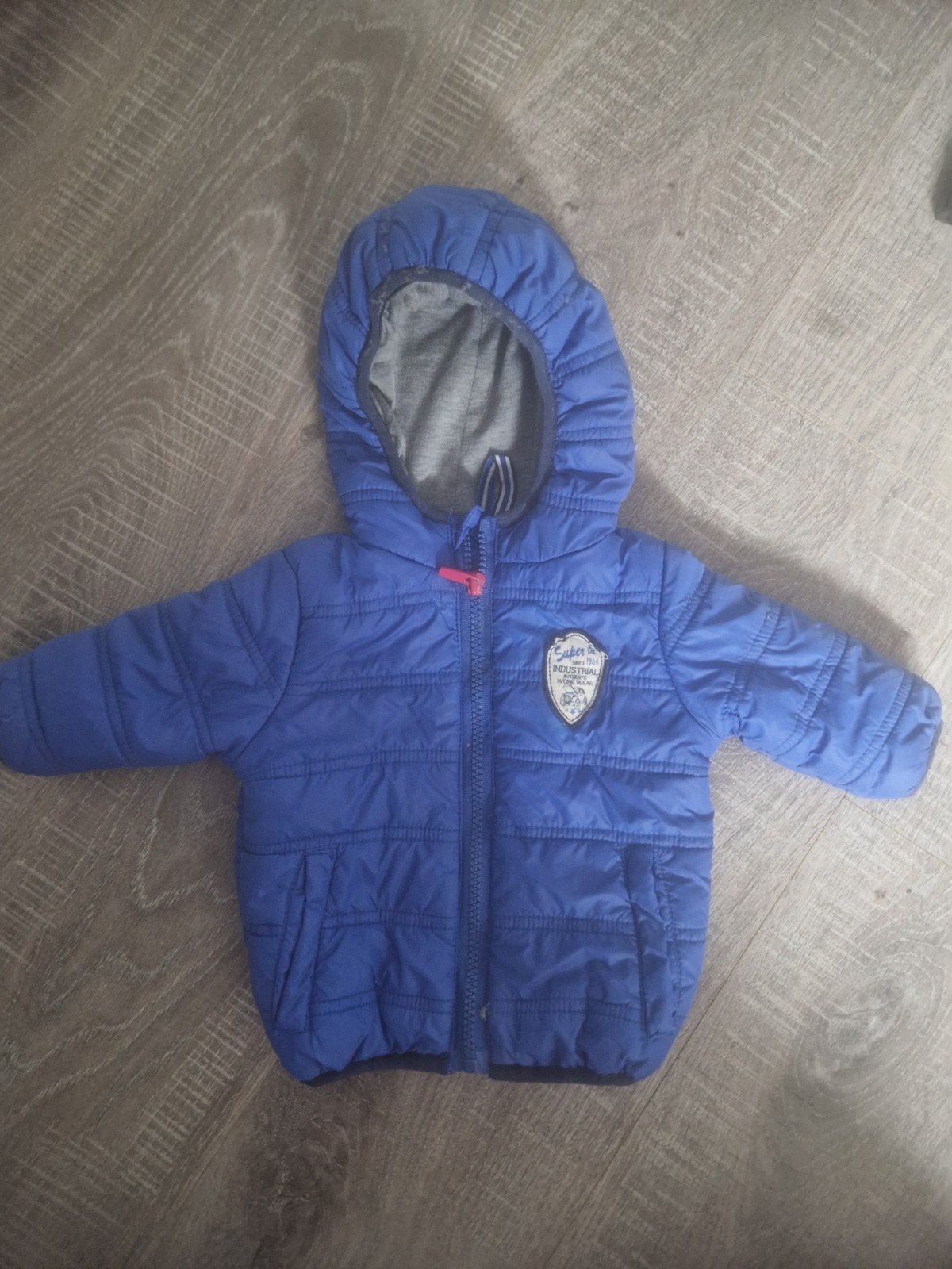Blauwe gewatteerde jas voor baby - maat 62', Ophalen of Verzenden, Gebruikt, Een Stoere Jas, Jongen of Meisje