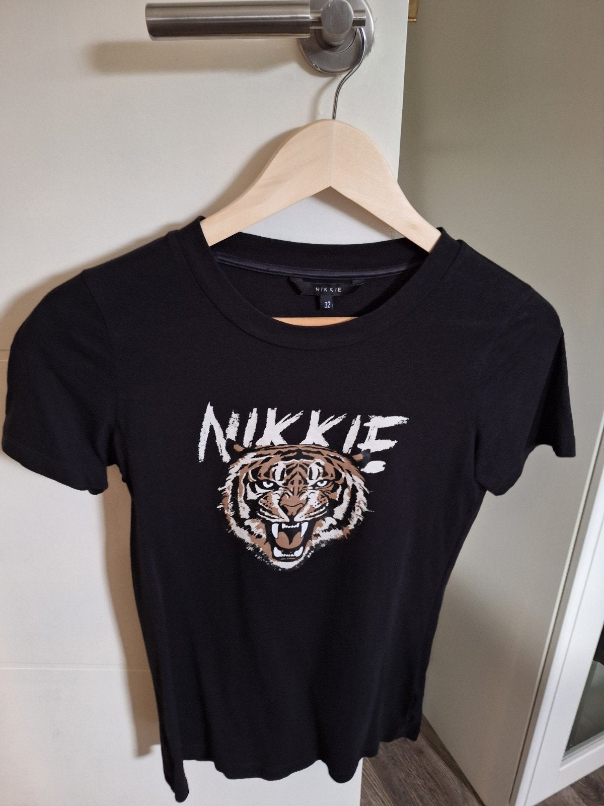 Nikkie t-shirt maat 32, Zwart, Ophalen of Verzenden, Zo goed als nieuw, Maat 34 (XS) of kleiner