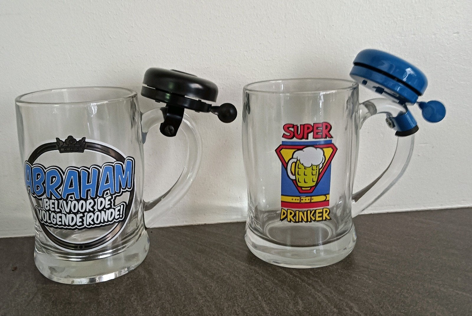 Bierpullen met fietsbel - Super Drinker & Abraham, Ophalen of Verzenden, Zo goed als nieuw