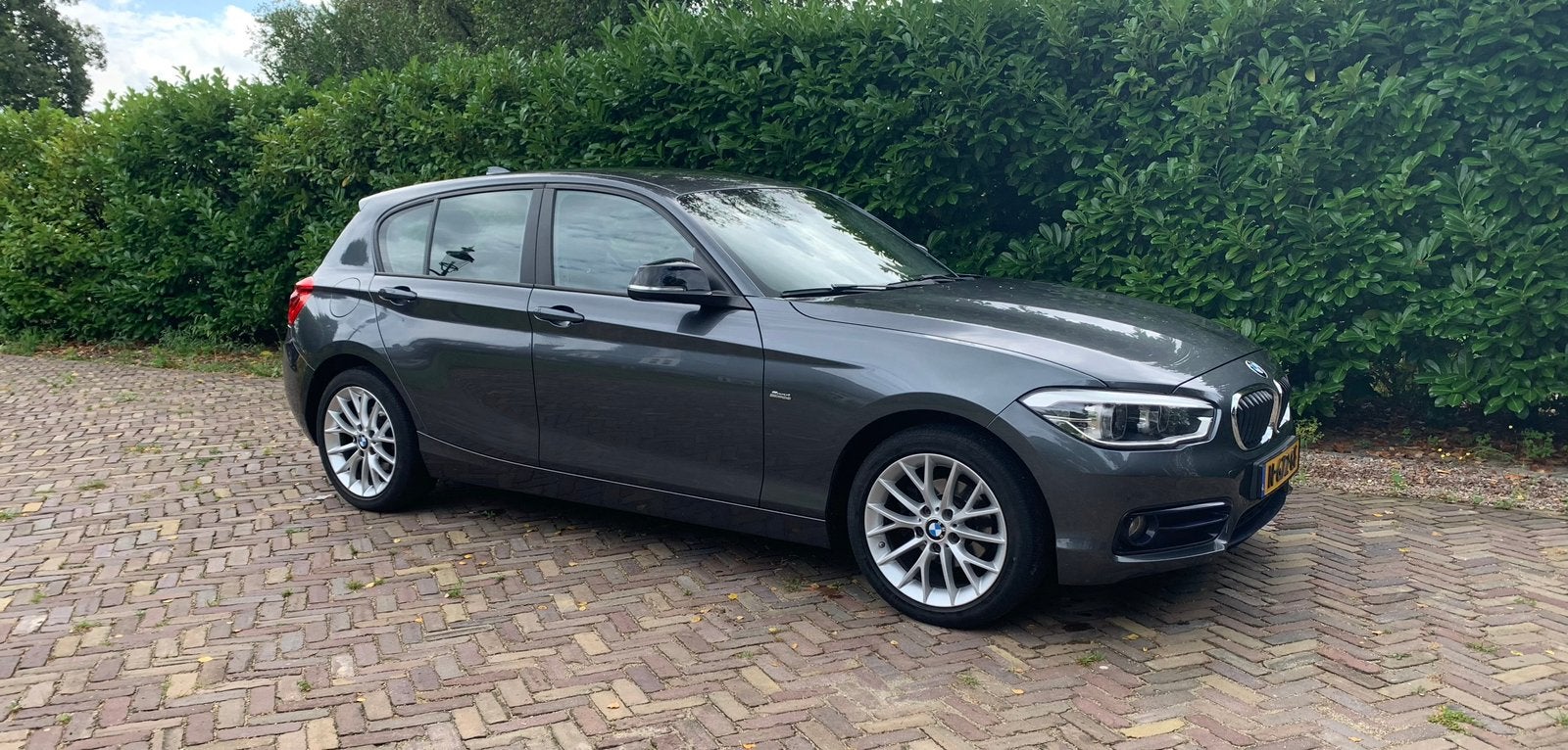 BMW 1-Serie 118i 136pk 2015 Grijs, 1-Serie, 1280 kg, Zwart, Handgeschakeld
