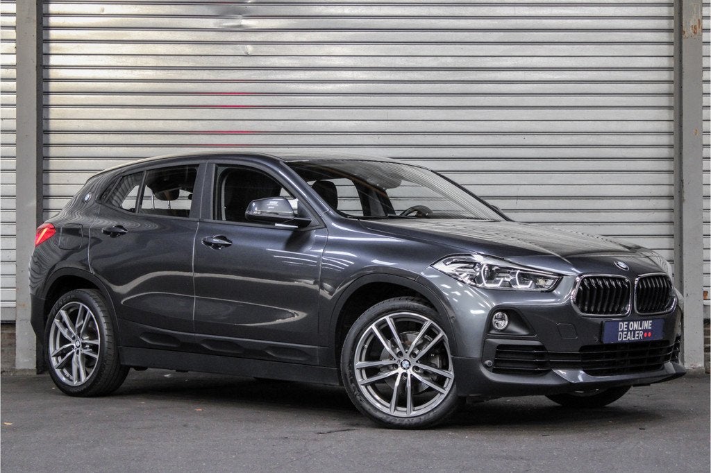 BMW X2 sDrive18i AUT Executive |19inch|Sfeer|Sportstoel|HUD, Auto's, BMW, X2, Euro 6, Leder, 3 cilinders