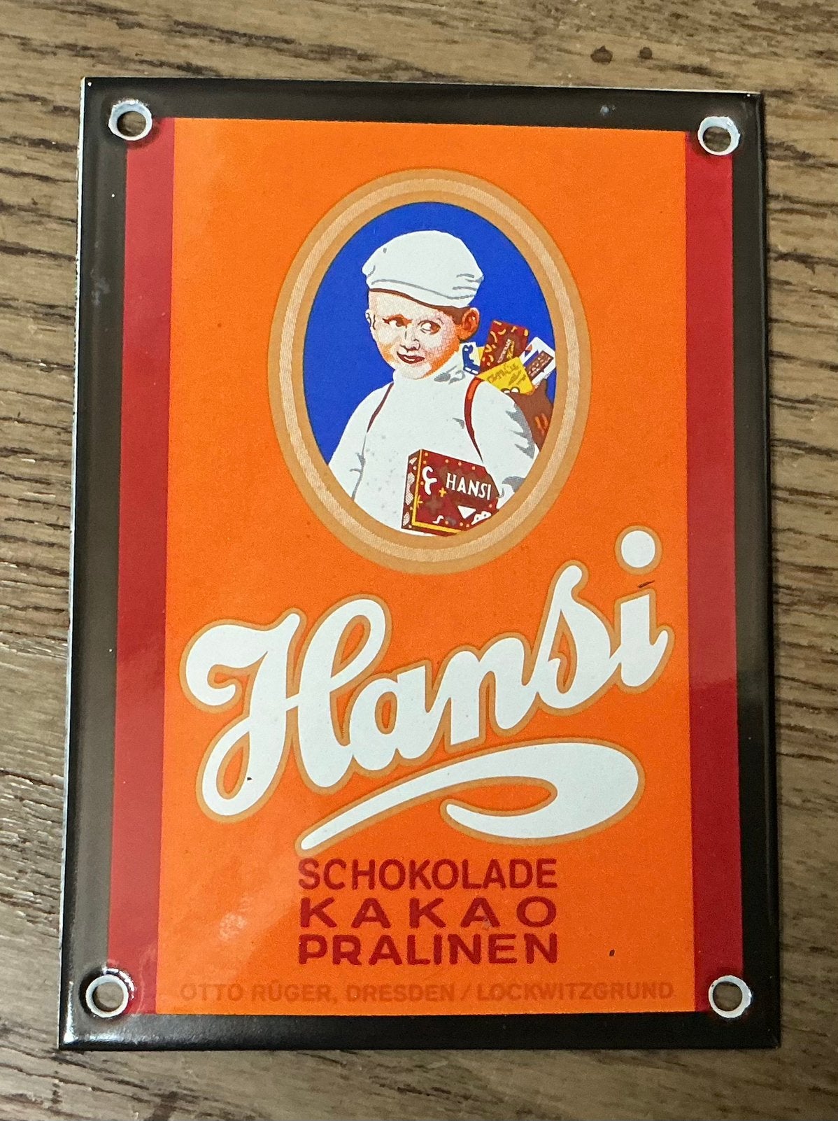 Emaille deurpostje HANSI kakao, Ophalen of Verzenden, Gebruikt, Reclamebord