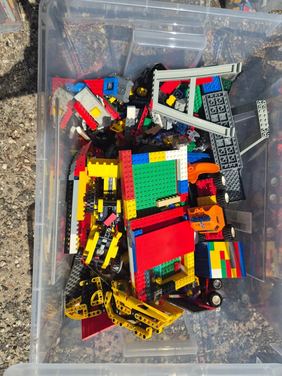 Lego 2 bakken vol, Ophalen