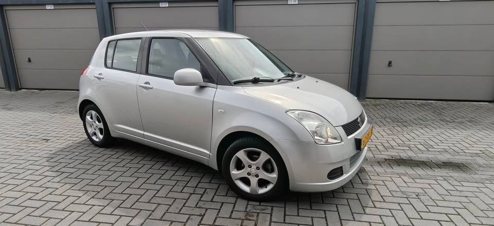 Suzuki Swift 1.3 5DRS 2007 Grijs, Auto's, Suzuki, Voorwielaandrijving, 40 €/maand, 965 kg, Swift