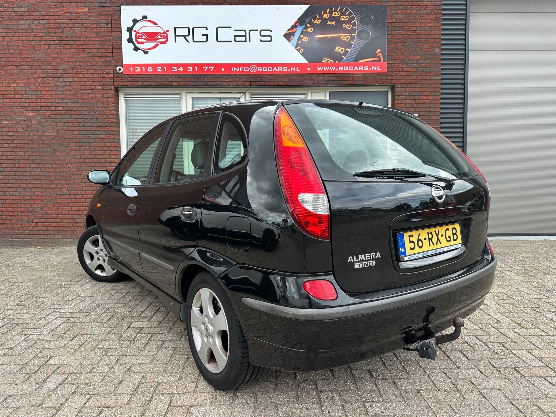 Nissan Almera Tino 1.8 Acenta / Navi / Camera / Leder / Airc, Auto's, Nissan, 4 cilinders, Met garantie (alle), Almera Tino, Zwart