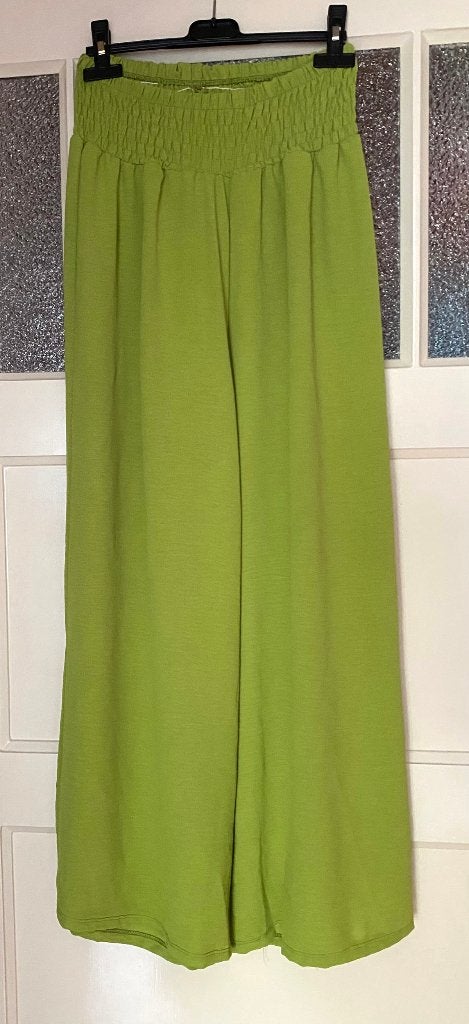 Wijde groene broek, maat 34-42 / tailleomvang 60-100 cm, Maat 38/40 (M), Ophalen of Verzenden, Zo goed als nieuw, Lang