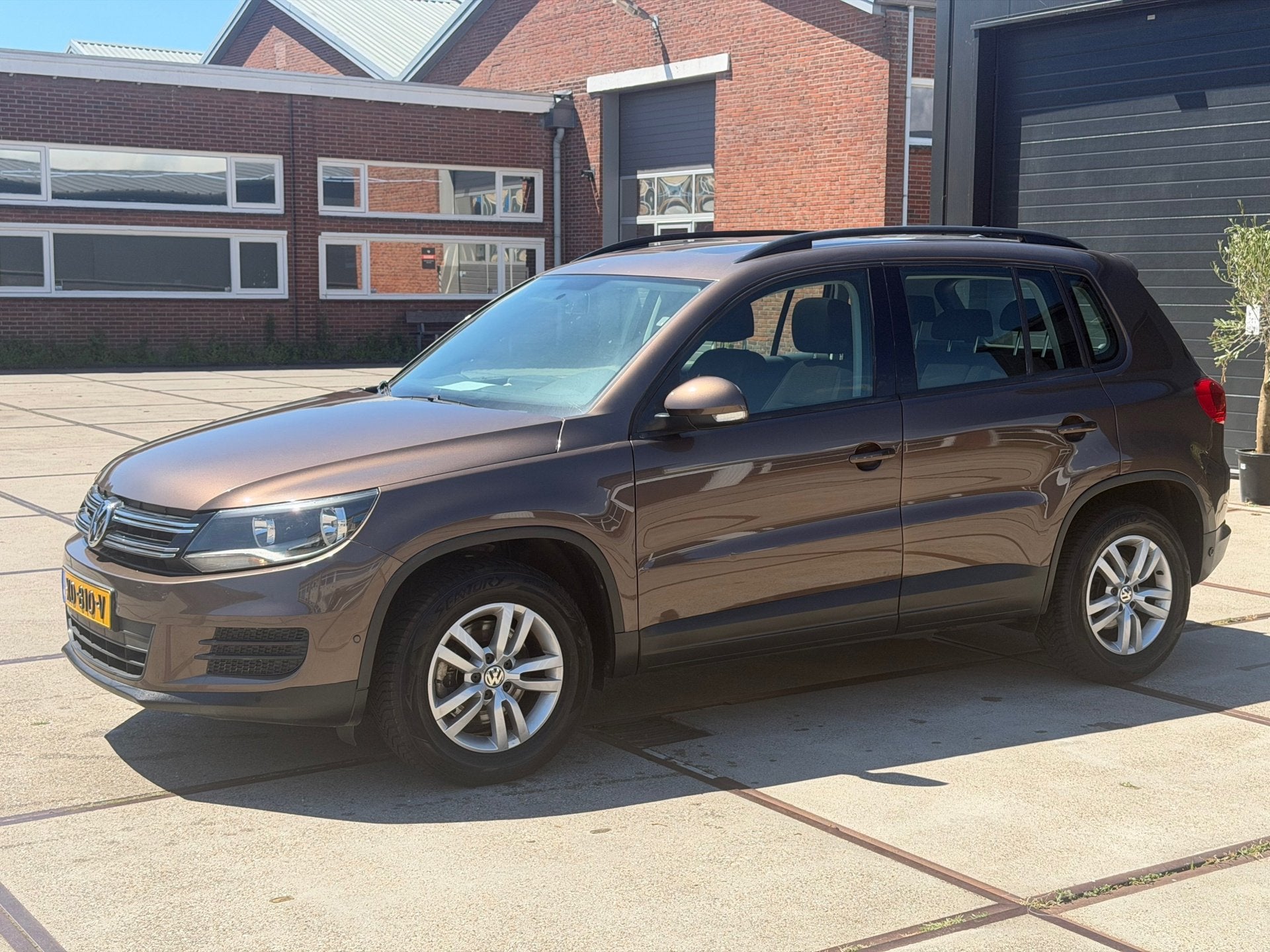 Volkswagen Tiguan 1.4 TSI Sport&Style Pano Cruise Navi Trekh, Auto's, Volkswagen, Voorwielaandrijving, Euro 5, Gebruikt, Zwart