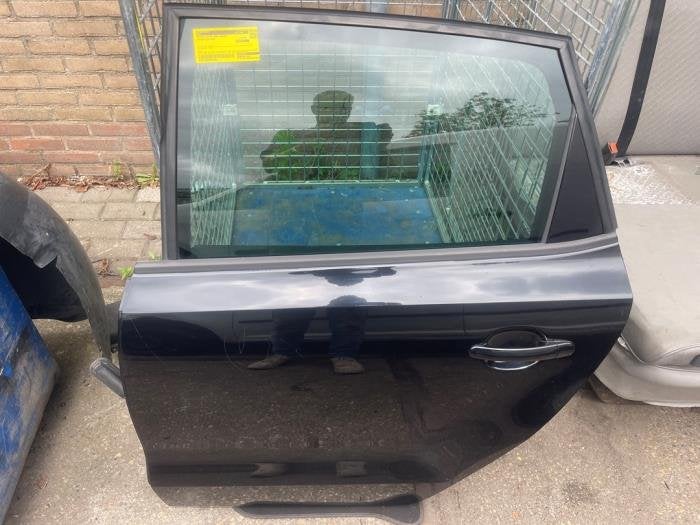 Portier 4Deurs links-achter van een Volkswagen Polo (LC9X)