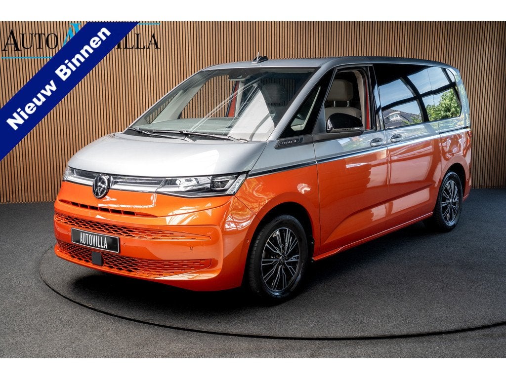 Volkswagen Multivan 1.4 eHybrid 7p Pano HUD Leer Navi Camera, Auto's, Volkswagen, Gebruikt, Euro 6, 7 stoelen, Grijs