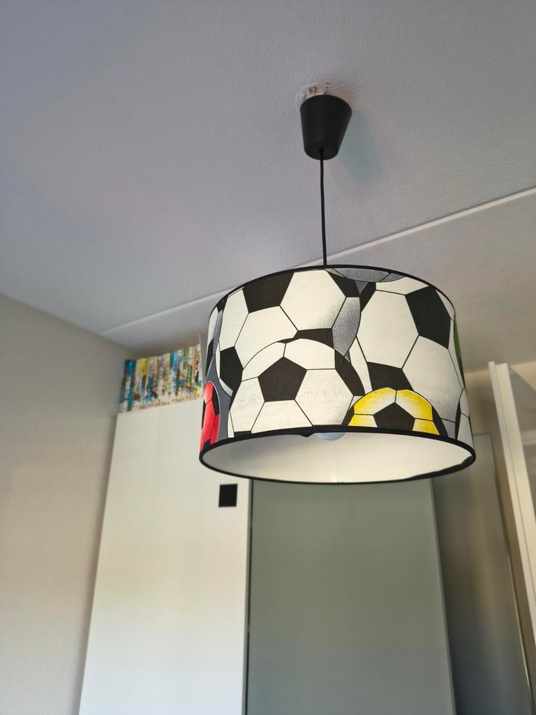 Voetbal lampenkap, Ophalen