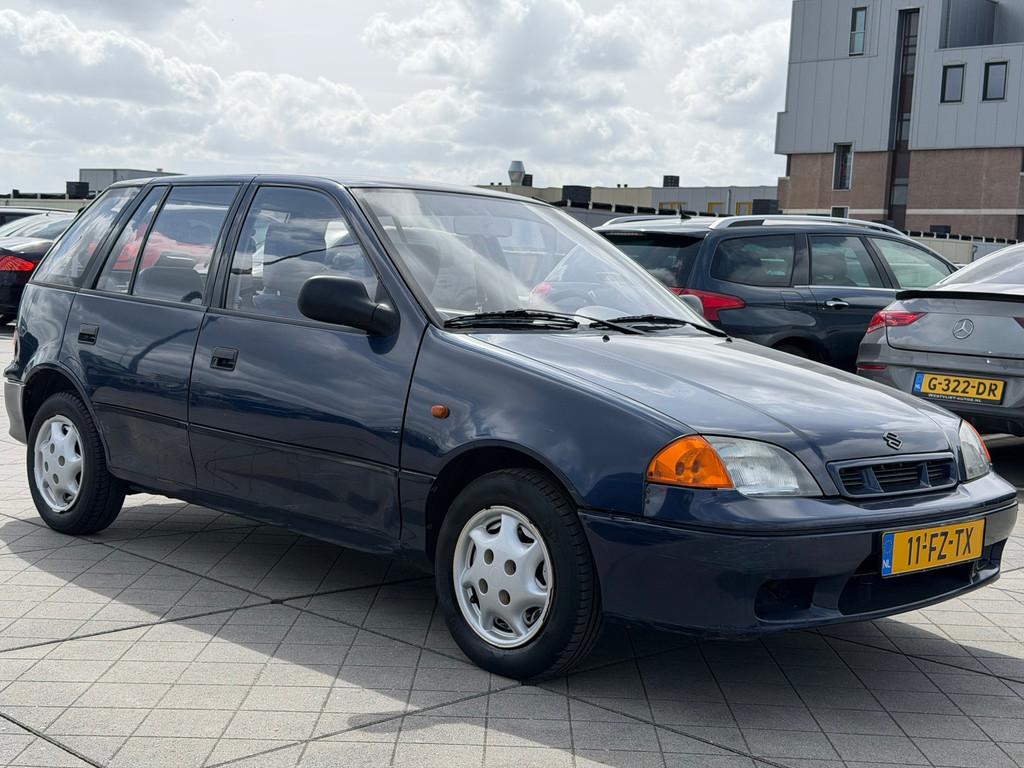 Suzuki Swift 1.3 GLX AUTOMAAT AIRCO Nieuwe Apk Goed Onderhou, Auto's, Gebruikt, 4 cilinders, Blauw, Bedrijf