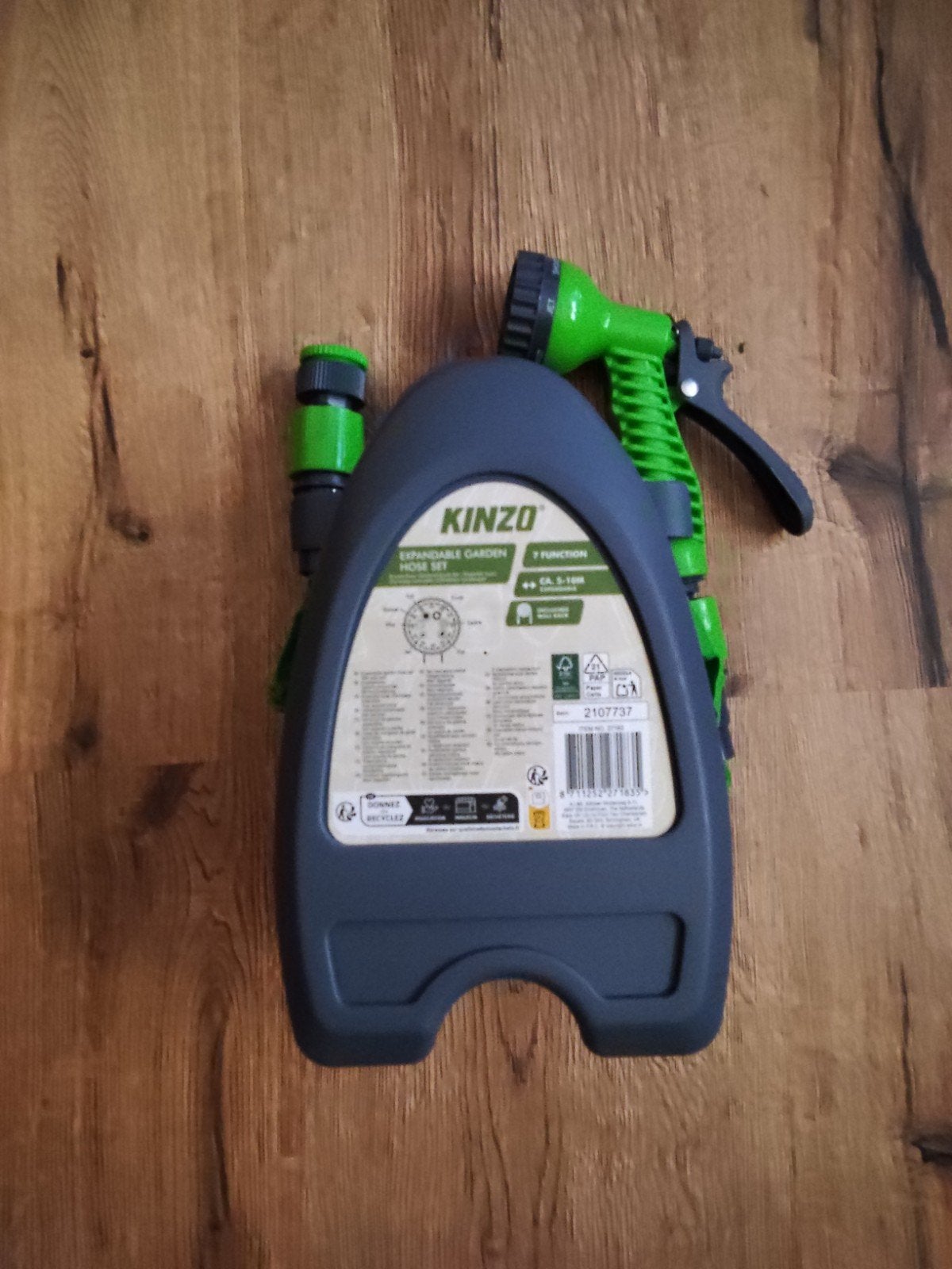 Kinzo uitrekbare tuinslang met ophang en spuitstuk, Tuin en Terras, Ophalen of Verzenden, Zo goed als nieuw, Tuinslang