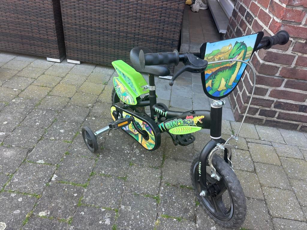 Kinderfiets Dino met zijwieltjes - 12 inch, Ophalen, Gebruikt, Velgrem, Minder dan 16 inch
