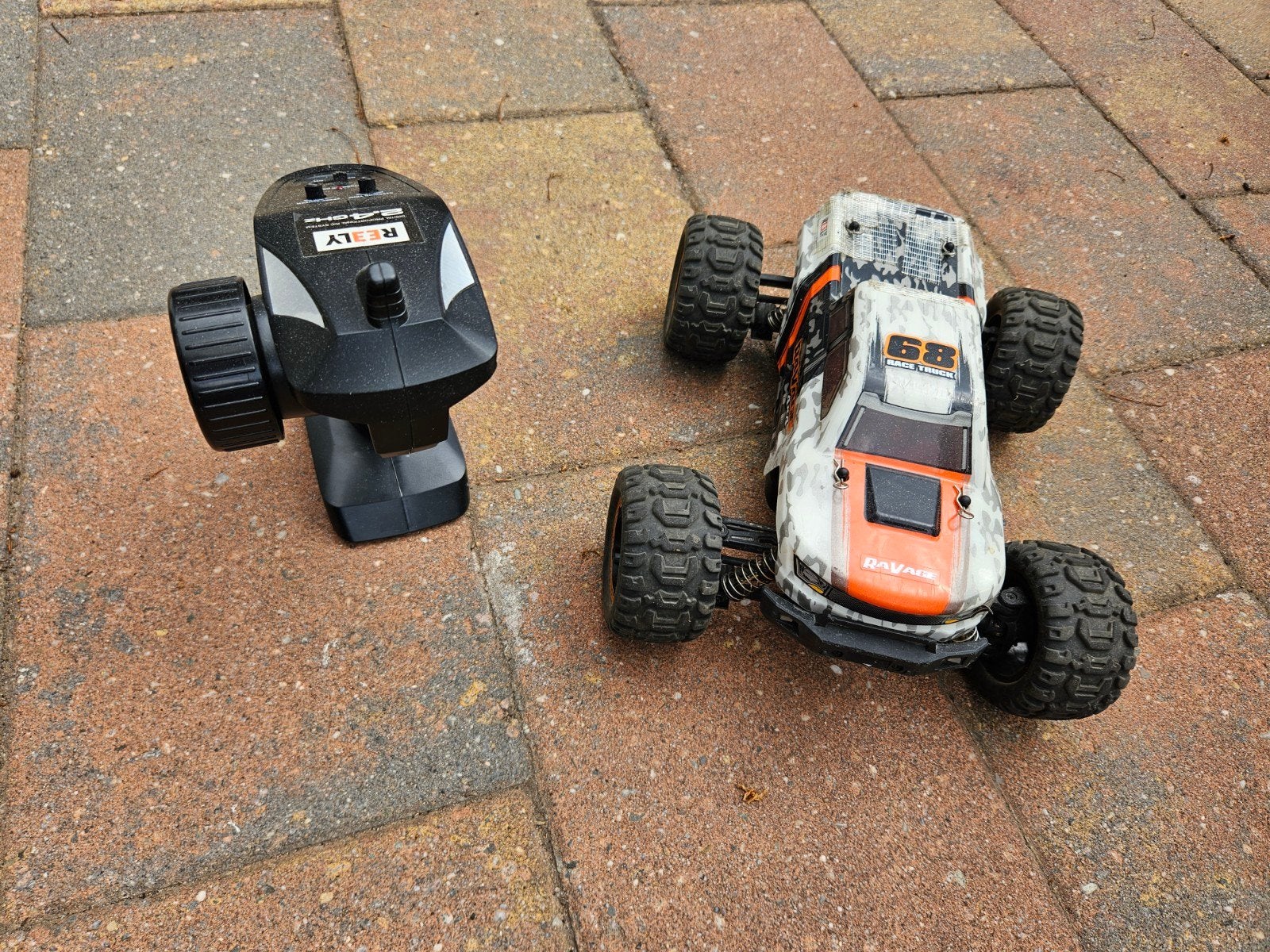 Reely RaVage 4x4 V2 Oranje-wit Brushed 1:16 RC auto, Ophalen