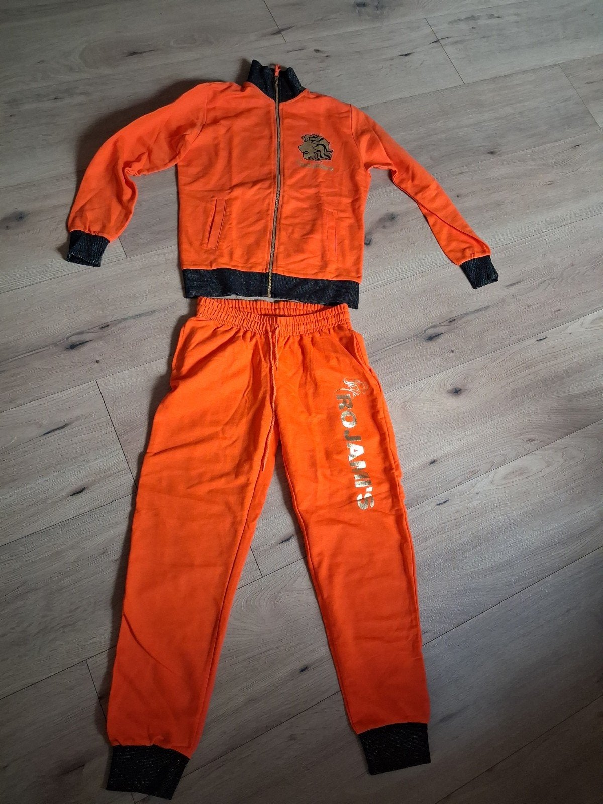 Oranje Romani's trainingspak maat S/M, Onbekend, Ophalen of Verzenden, Gedragen